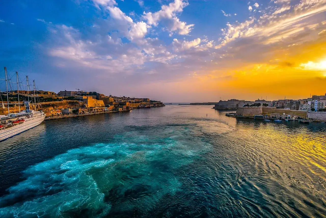 Malta Grand Harbour at sunset — short-let property management